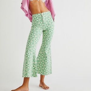 Free people green printed flare jeans!